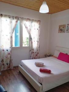 Postel nebo postele na pokoji v ubytování Tony Hotel