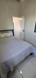 Ένα ή περισσότερα κρεβάτια σε δωμάτιο στο Suite in Arraial do Cabo +8 φωτογραφίες