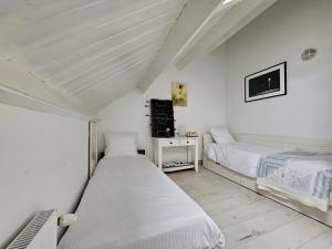 Ένα ή περισσότερα κρεβάτια σε δωμάτιο στο Apartment South