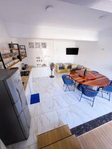 Una televisión o centro de entretenimiento en Dúplex Paracuru