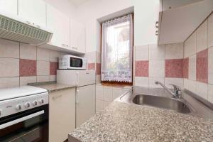 Kuchyň nebo kuchyňský kout v ubytování Apartment in Silo - Insel Krk 13498