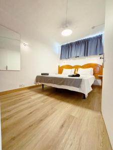a bedroom with a bed in a room at Seaview Friendly Holiday Home 8 in Playa del Ingles