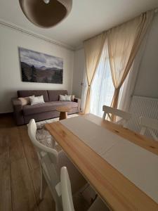 Postel nebo postele na pokoji v ubytování Cor Montis Apartments