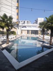 Bazén v ubytování Bienvenue chez nous nebo v jeho okolí