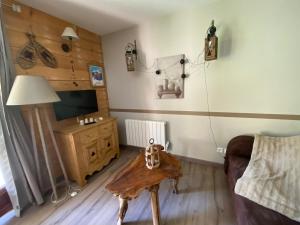 Photo de la galerie de l'établissement Appartement Les Esplaneilles avec parking- Terrasse et jardin, à Formiguères