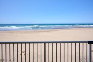 a view of a beach with the ocean at Ground Floor Condo - Ocean View - Pool & Hot Tub in Lincoln City