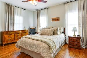 a bedroom with a bed and a ceiling fan at 8 Mi to Dtwn Mt Airy Mtn-View North Carolina Home 