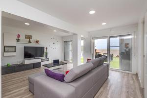 Μια τηλεόραση ή/και κέντρο ψυχαγωγίας στο Villa Prestige Beach