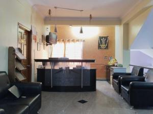 Posezení v ubytování Hotel O Sree Nandanam Residency + 53 fotografií