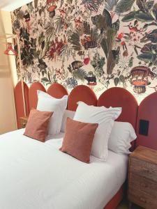 Postel nebo postele na pokoji v ubytování Lemon Suites Santander