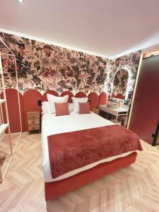 Postel nebo postele na pokoji v ubytování Lemon Suites Santander