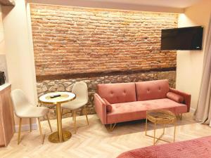 TV a/nebo společenská místnost v ubytování Lemon Suites Santander