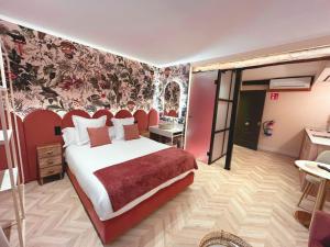 Postel nebo postele na pokoji v ubytování Lemon Suites Santander