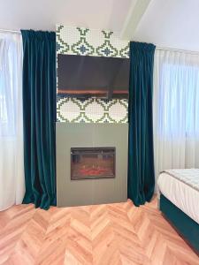 Postel nebo postele na pokoji v ubytování Lemon Suites Santander