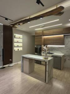 a kitchen with a large white island in a room at Lovely One-bedroom Villa in Sharm El Sheikh