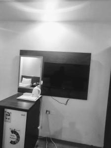 Kuchyň nebo kuchyňský kout v ubytování فندق روضة الششة قريب من محطة حافلات مجانية