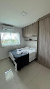 Katil atau katil-katil dalam bilik di Apartamento Aconchego de Carapibus +36 gambar