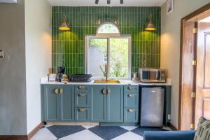A kitchen or kitchenette at Travellers Beach Resort