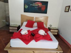 Postel nebo postele na pokoji v ubytování Libélula finca-hotel