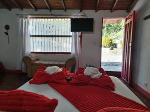 Postel nebo postele na pokoji v ubytování Libélula finca-hotel