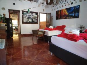 Postel nebo postele na pokoji v ubytování Libélula finca-hotel