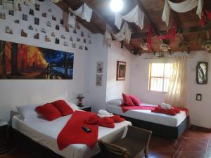 Postel nebo postele na pokoji v ubytování Libélula finca-hotel