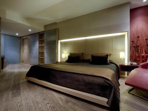 Posteľ alebo postele v izbe v ubytovaní Sofitel Barcelona Skipper