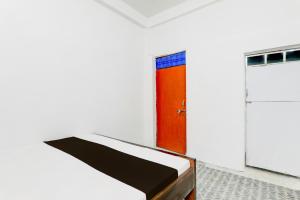 Postel nebo postele na pokoji v ubytování HOTEL O SHYAM