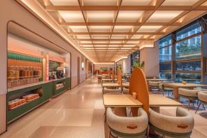 Posezení v ubytování Orange Hotel Beijing Daxing International Airport Terminal