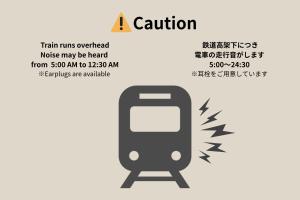 a picture of a cell phone with a collision at BON Hostel in Osaka