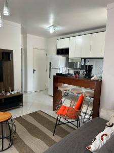 Kuchyň nebo kuchyňský kout v ubytování Ap Ubatuba