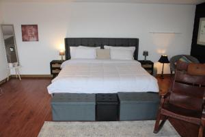 Letto o letti in una camera di mountain cabin with private waterfall and river