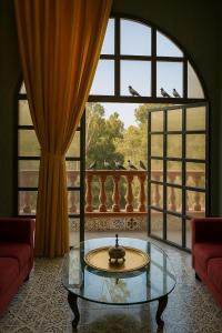 Posezení v ubytování Qila Hotel