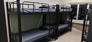 Postel nebo postele na pokoji v ubytování Jeea Hostel