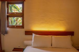 Postel nebo postele na pokoji v ubytování Relax in Nature Villa Namu no1