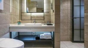 a bathroom with a sink and a toilet at Xana Lite Hotelle Yan'an Baota Mountain in Yan'an +93 photos