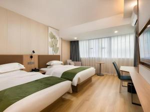 Postel nebo postele na pokoji v ubytování GreenTree Inn Express Fujian Ningde Ningchuan Road Qinghua Building + 109 fotografií