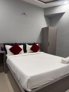 Ένα ή περισσότερα κρεβάτια σε δωμάτιο στο Smart Hotels