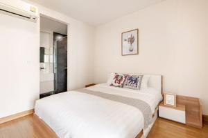 Ένα ή περισσότερα κρεβάτια σε δωμάτιο στο The Nimmana Condo 810 - Super Deluxe 1BR Mountain View Penthouse +37 φωτογραφίες