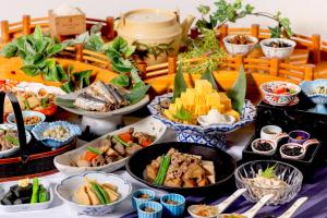 a table topped with lots of different types of food at Hotel Mariners Court Tokyo in Tokyo