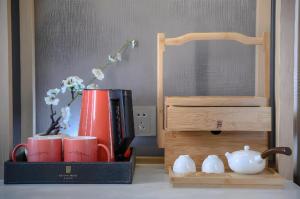 Příslušenství pro přípravu čaje a kávy v ubytování Echeng Hotel Nanning the Mixc Convention