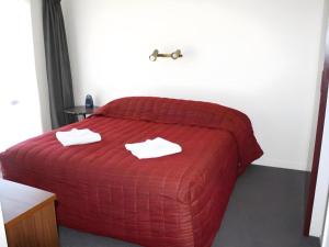 Postel nebo postele na pokoji v ubytování Oxford Court Motel + 82 fotografií