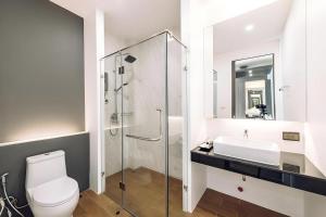 Koupelna v ubytování PIMDARA HOTEL
