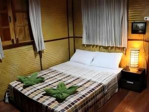 Postel nebo postele na pokoji v ubytování Green Cottage Beach Resort