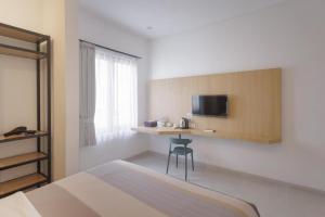 Μια τηλεόραση ή/και κέντρο ψυχαγωγίας στο Paskal Inn