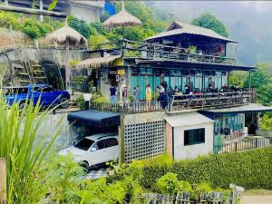Zahrada ubytování The Mae Homstayผาฮี้