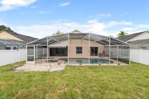 a house under construction with a pool at Chic & Cozy Hideaway in Davenport