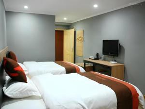 Μια τηλεόραση ή/και κέντρο ψυχαγωγίας στο Jun Hotel Jiangsu Nanjing Gulou District Gupinggang +111 φωτογραφίες