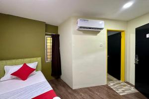 Postel nebo postele na pokoji v ubytování Hotel MSP Bukit Bintang