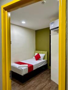 Postel nebo postele na pokoji v ubytování Hotel MSP Bukit Bintang